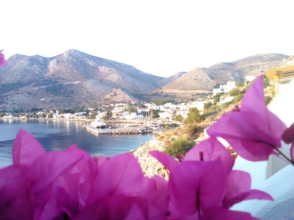 Bougainvillea framing the bay of Livadia on Tilos